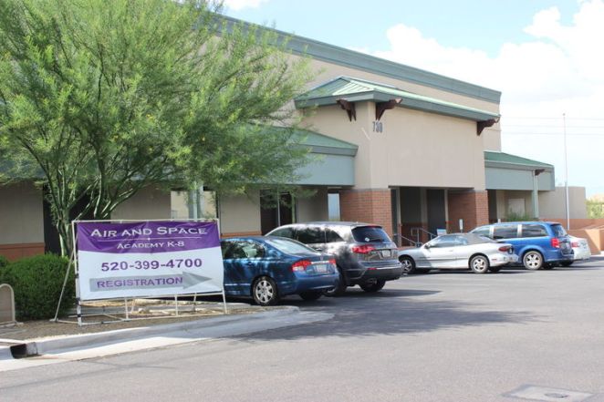 Air and Space Academy advertises for enrollment outside its school in Madera Marketplace in Sahuarita.